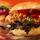 Illustration for article titled Time is a flattened fried chicken breast: A history of the chicken sandwich wars